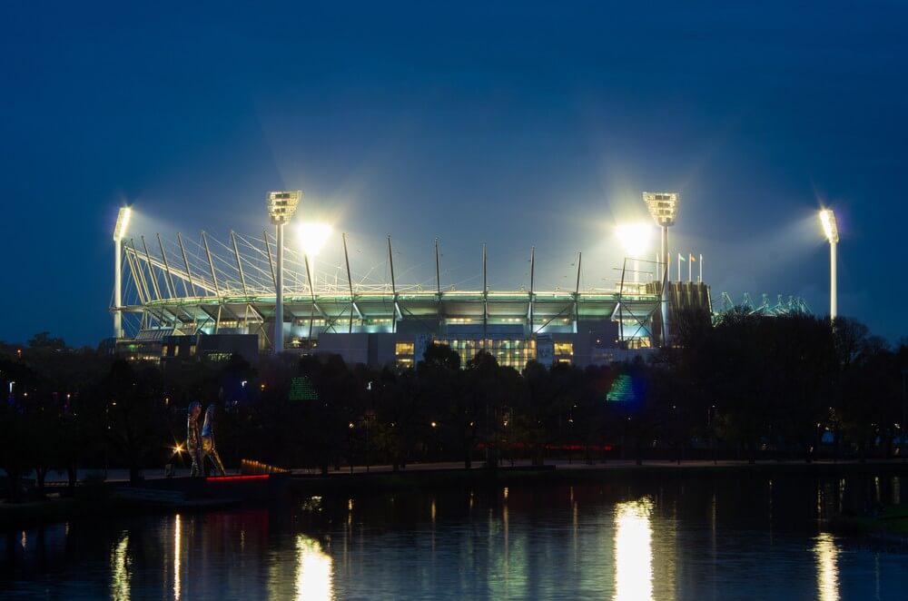 AU Private Tours MCG loodlit for a twilight match of Australian Rules Football